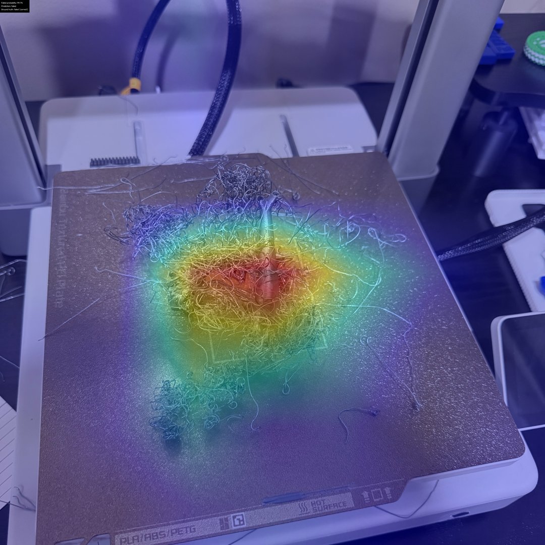 Bambu Lab print bed covered in a dense nest of tangled filament, with the attention heat concentrated on the centre of the nest